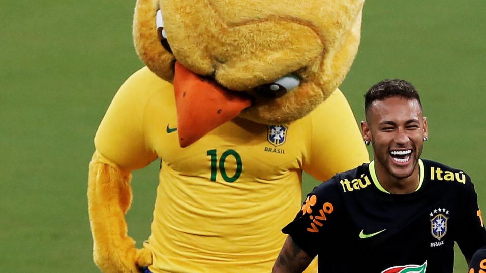 Neymar with the Brazil mascot